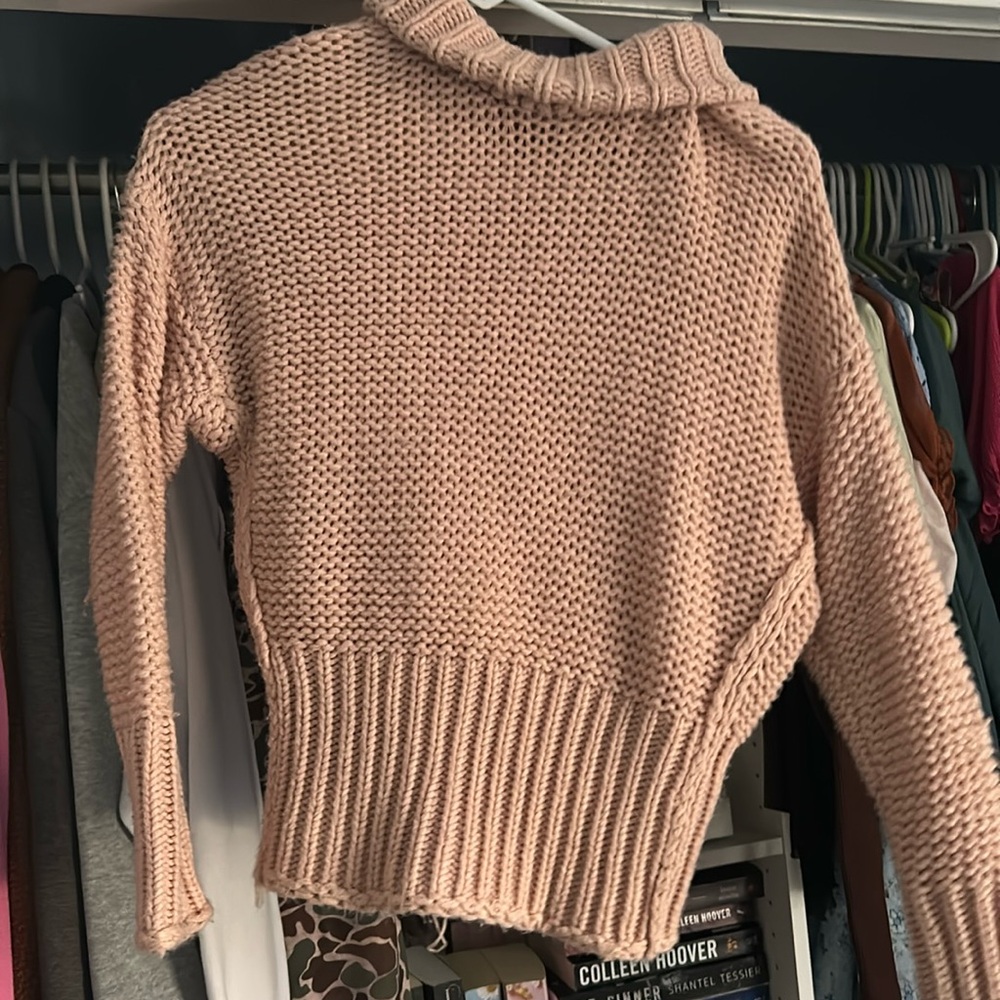 Pink knitted sweater